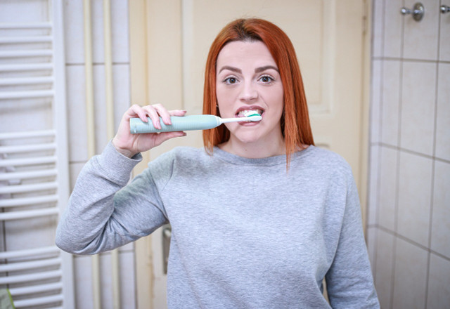 You should brush your teeth for at least two minutes twice a day.