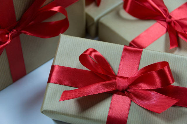 Brown packing paper is eco-friendly and cheaper than traditional Christmas wrapping paper.