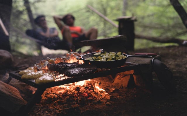 A benefit of a cast iron skillet outdoor enthusiasts will enjoy: it can make cooking while camping much easier.
