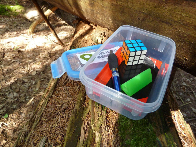 Some typical treasure inside a geocache.