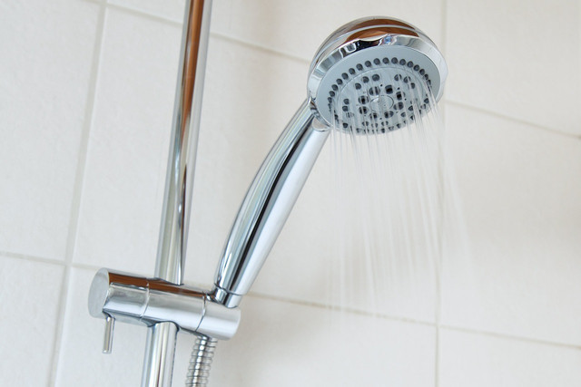 Keep showers short as a way to conserve water. 