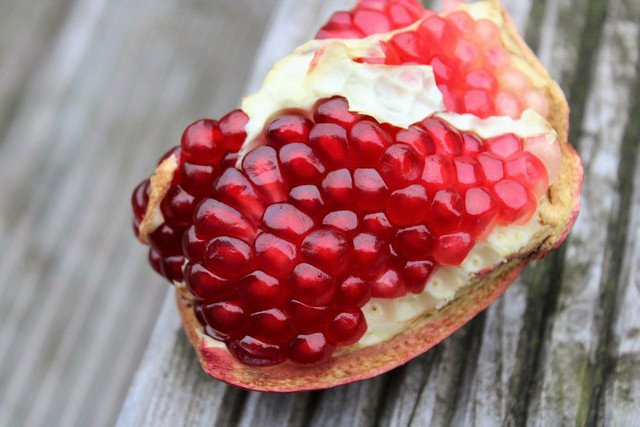 You can make pomegranate juice by hand, too, just be careful of staining clothing.