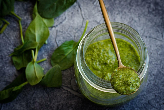 Nutritional yeast adds a great cheesy flavor to vegan pesto. 