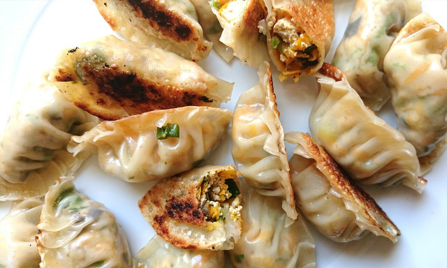 Crisp, chewy and satisfying, dip your vegan potstickers in to the sauce of your choice.