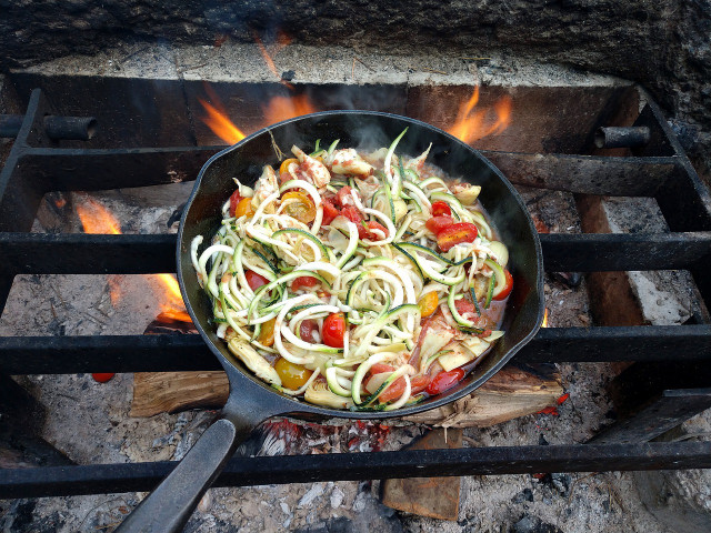 Cooking on a campfire gives food a unique wood-fired taste