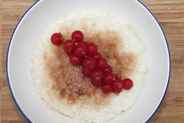 Rice pudding can be garnished with berries, cinnamon, sugar, oranges and more and makes the perfect dessert for your next vegan holiday feast.