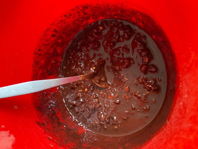 The cacao mixture for the vegan chocolate will be slightly thick at this stage, but should still be easy to stir.