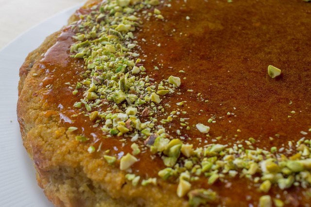For a color contrast, you could top your almond cake with pistachios.