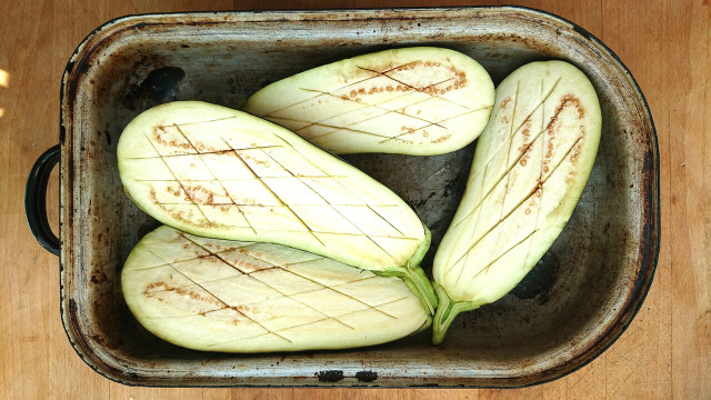 Scoring the flesh speeds up the cooking time and ensures the whole vegetable is seasoned to perfection.