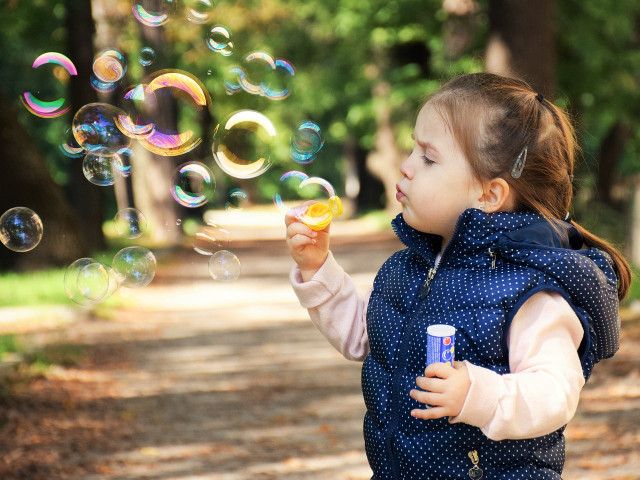 Bubbles can make garden parties fun for kids.