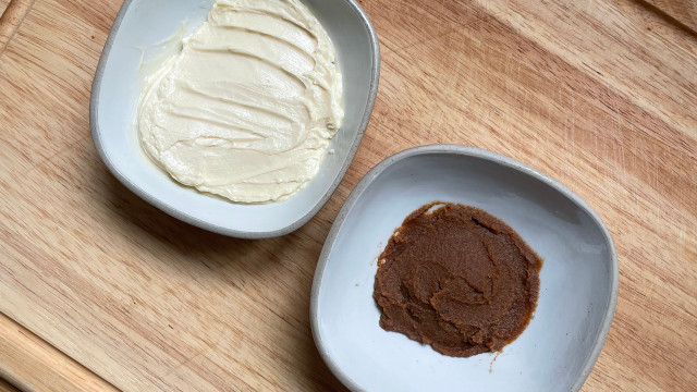 Vegan miso butter is made by combining margarine and miso paste.