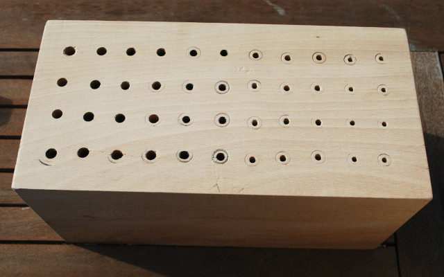 drilled wooden block 
