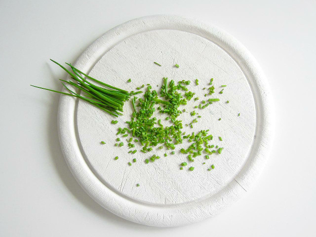 Wash and chop your chives before freezing them.
