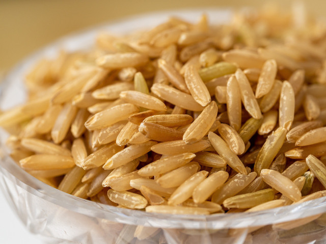 Brown rice flour is made by grinding uncooked brown rice in a food processor.