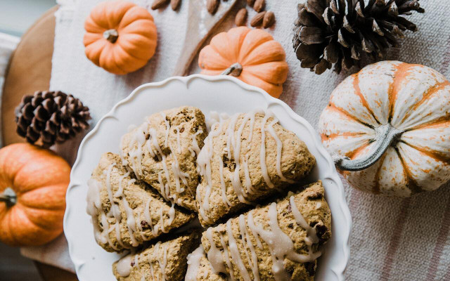 You can use pumpkin spice syrup to flavor icing for your pumpkin scones.