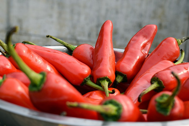 Freezing hot peppers whole helps preserve more flavor.