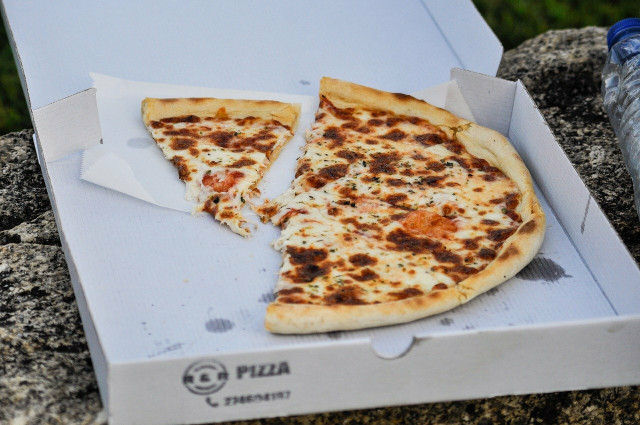 Pizza boxes can be recycled once the food is scraped off.