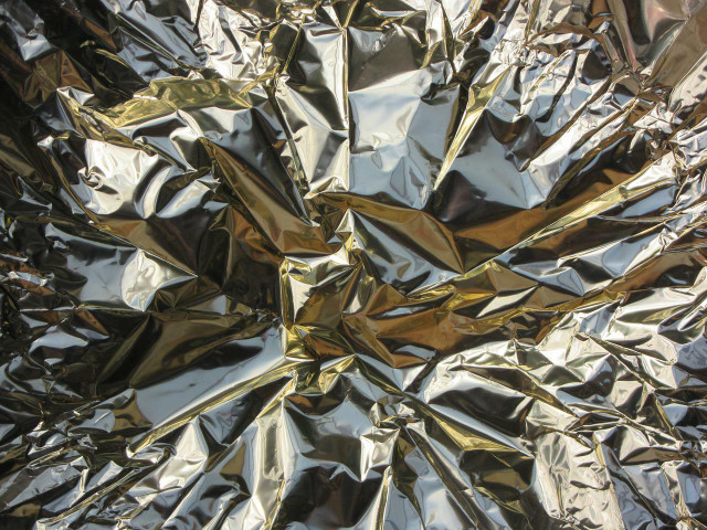 Foil may catch stray food and grease, but it can also cause food to cook unevenly.