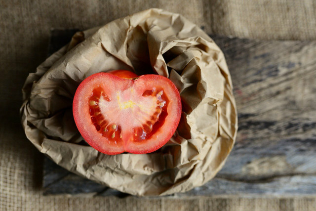 Manual extraction for saving tomato seeds is simpler and less time-consuming than fermentation.