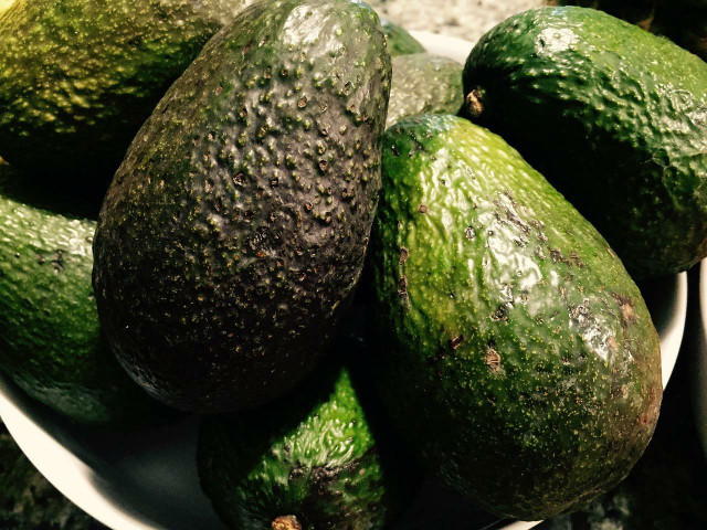 Ripe avocados have darker skin.