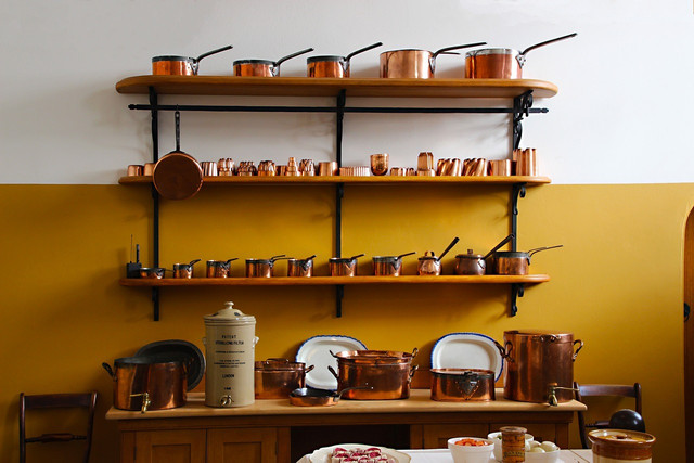 Shiny copper pans and pots are a great addition to any kitchenware setup.