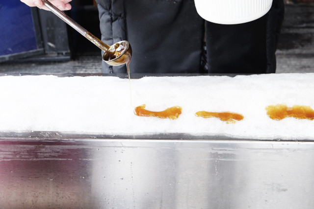 Maple taffy is made by pouring hot maple syrup onto cold snow or ice. 