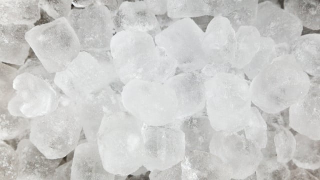 Learn how to clean your garbage disposal easily with ice cubes and salt.