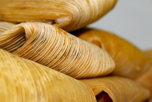 Tamales can be wrapped in corn husks or banana leaves.