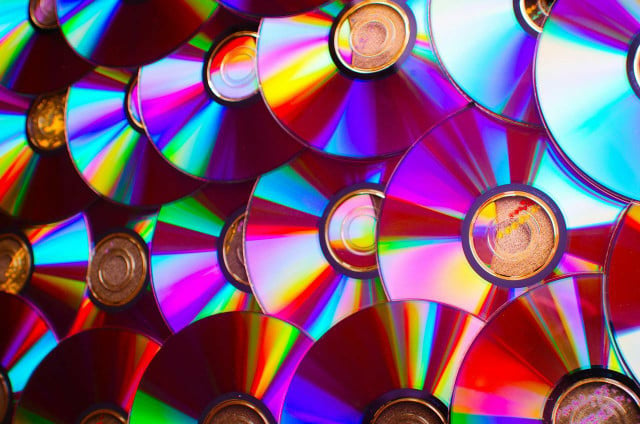 Instead of donating or selling DVDs, you can upcycle them by turning them into art.