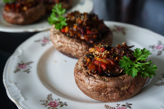 Vegan stuffed mushrooms can be prepared in less than ten minutes and allows for variation with the filling.