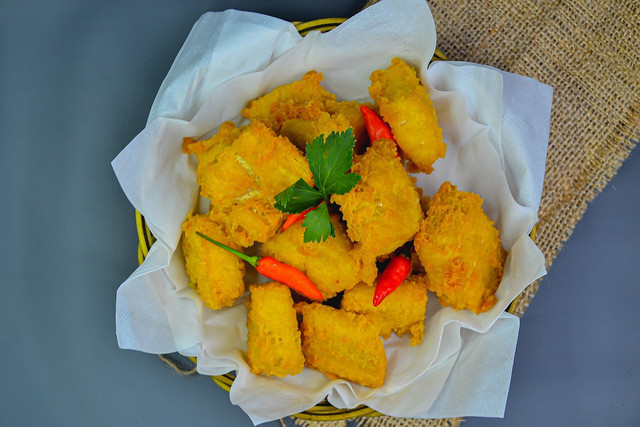 Battered an deep-fried crispy tofu, soft in the center and crisp on the outside