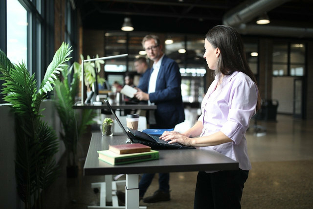 Sitting can be avoided in the workplace by using a standing desk. 