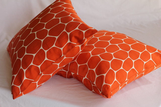 Adding a few throw pillows to your bed or desk chair can be a fun way to make your room feel more like home.