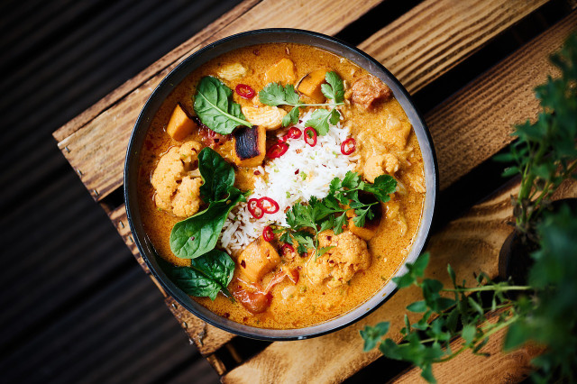 Garnish this vegan peanut stew with cilantro, chopped peanuts and serve with cooked basmati rice.