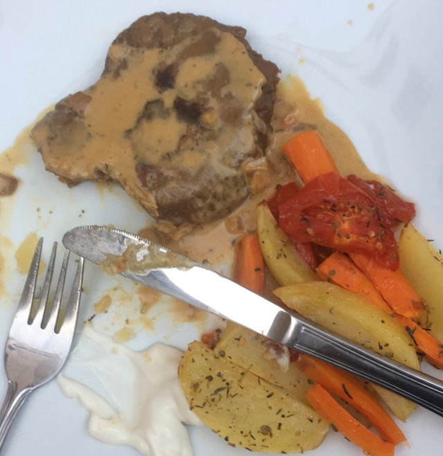 A homemade seitan steak paired with a peppercorn sauce, vegan mayonnaise and oven cooked vegetables.