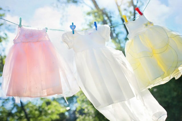 Use an outdoor clothesline to reduce your carbon footprint after washing pillows and other textiles.