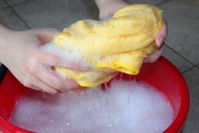 Learn how to clean your electric kettle on the outside with a soapy rag.