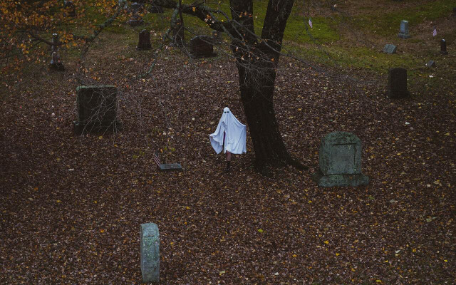 Looking for DIY Halloween costume ideas? Stick with a classic and be a bedsheet ghost. 