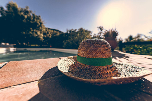 Large hats make for a good sun cover.