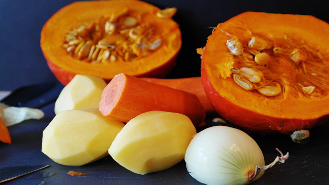 Many vegan pumpkin holiday dishes go well together with sweet potatoes, regular potatoes, onion and ginger.