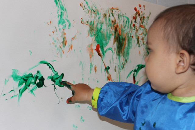 Baby can get creative by finger painting.