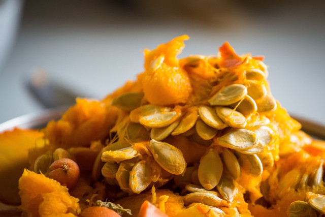 Wash the flesh off fresh pumpkin seeds before making this smoked pumpkin seed recipe. 
