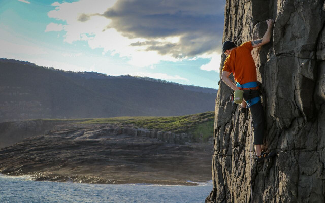 free-soloing-involves-specialized-footwear-and-cha-cc0-public-domain-unsplash-steve-bruce-230427_download Free soloing involves specialized footwear and chalk.