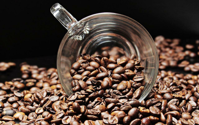 Store your coffee beans at room temperature, in a sealed container, and away from light.