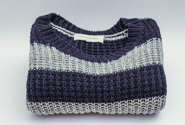 Un-shrinking is more challenging than shrinking a sweater; when in doubt, always use less heat.