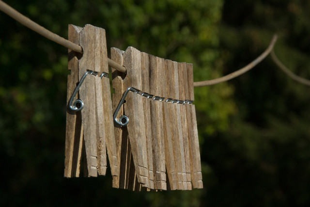 Attach your scented clothespin to a handy surface inside the car to make a simple DIY car air freshener. 