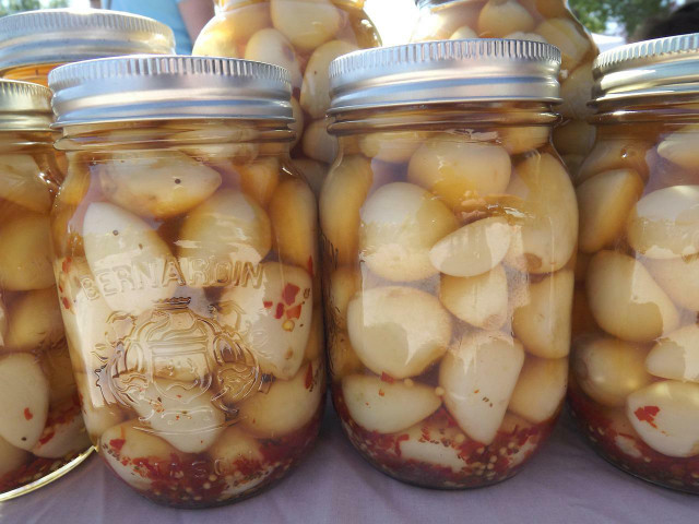 Store roasted garlic submerged in oil in a jar for a friend or loved one for a unique and delicious gift.