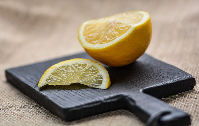 Sliced lemon helps to brighten the flavor of sweet woodruff. 