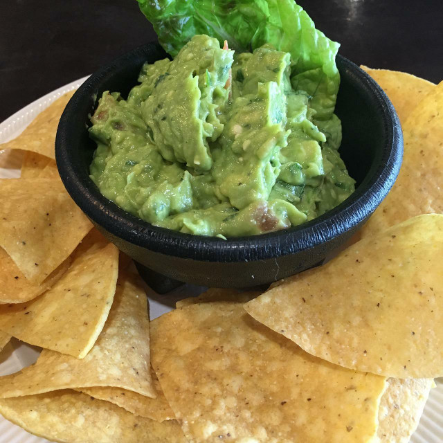 A vegan side at Chipotle includes chips and guacamole.