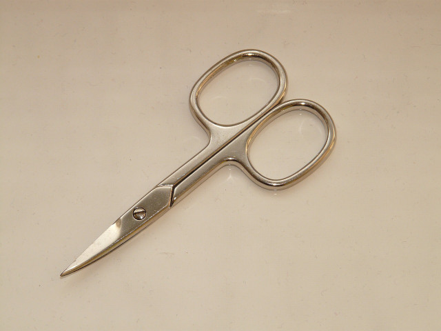 A pair of sterile cuticle scissors are useful for removing hangnails. 